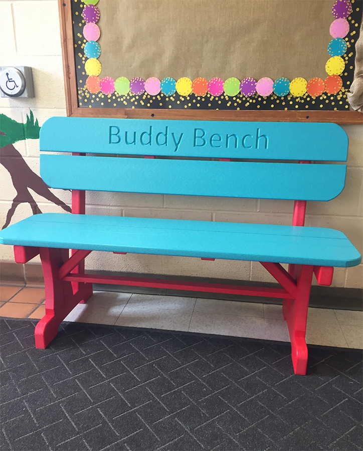 four foot poly bench with back shown in Aruba blue on red