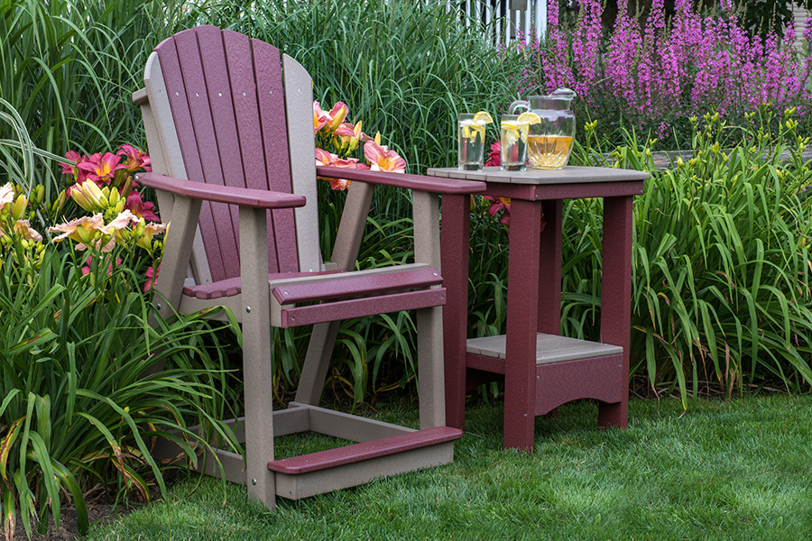 adirondack stationary chair, counter height, shown in cherry on weatherwood w/ 31" oval end tale shown in weatherwood on